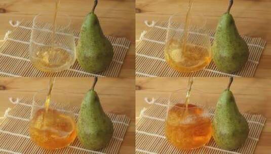 透明玻璃鲜榨梨汁高清在线视频素材下载