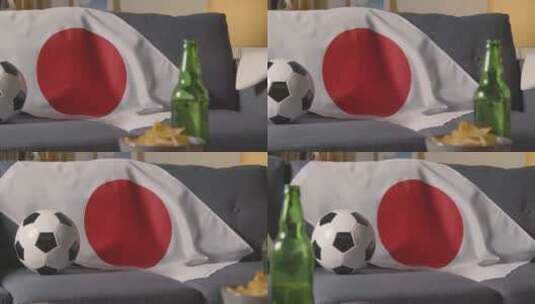 日本国旗挂在家里的沙发上高清在线视频素材下载