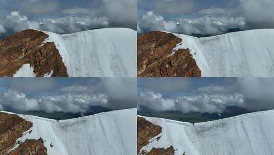 航拍攀登沙鲁里山脉尼登贡嘎雪山的登山者高清在线视频素材下载