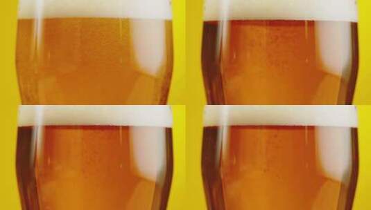 啤酒在玻璃杯中的慢镜头特写高清在线视频素材下载