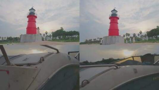 厦门高清夕阳下的灯塔渔船高清在线视频素材下载