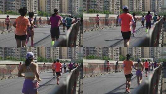 马拉松比赛中奔跑的运动员背影高清在线视频素材下载