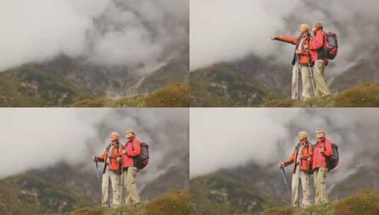 山顶上的两名高级徒步旅行者高清在线视频素材下载
