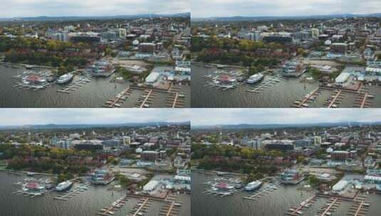 华丽的宽无人机拍摄的伯灵顿，佛蒙特州的海滨尚普兰湖高清在线视频素材下载
