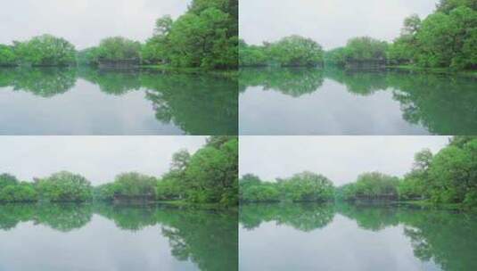 江南西湖浴鹄湾春天春雨中的亭台楼阁水榭高清在线视频素材下载