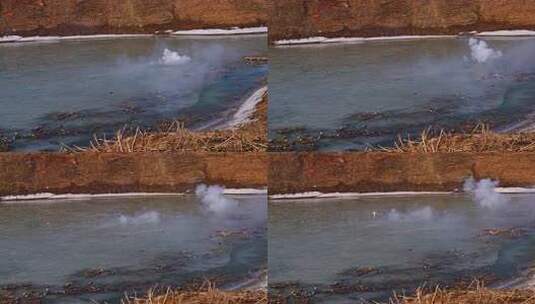 结冰湖面升起烟雾的自然景象高清在线视频素材下载