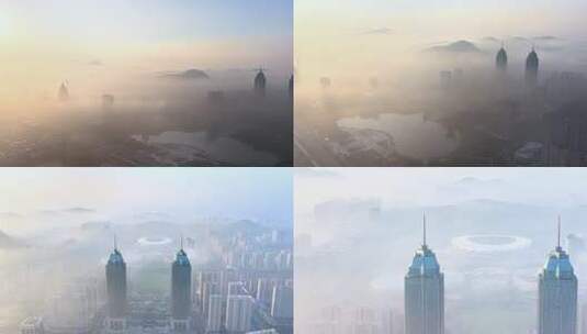 航拍云雾中的枣庄新城市政中心高清在线视频素材下载