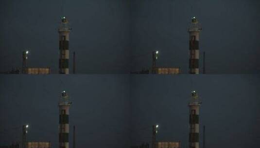 夜晚码头闪烁的灯塔高清在线视频素材下载