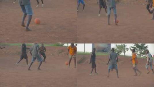 非洲孩子快乐地踢足球高清在线视频素材下载