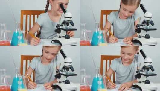 女孩使用显微镜观察高清在线视频素材下载