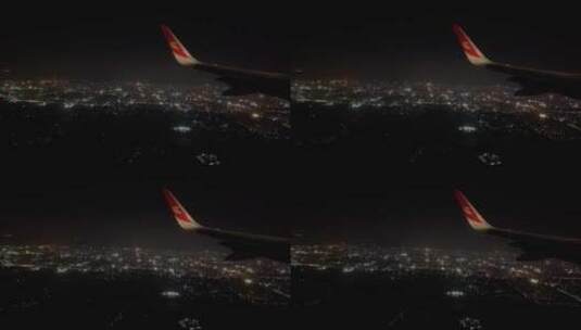 飞机内拍下降落地城市灯光高清在线视频素材下载
