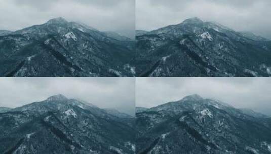 航拍暴风雪中的巍峨群山高清在线视频素材下载