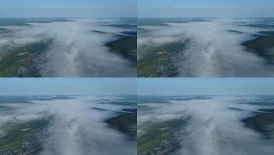 航拍大兴安岭云雾中的林场山村高清在线视频素材下载