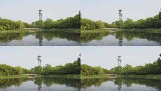 北京奥林匹克塔湖面倒影树林倒影高清在线视频素材下载