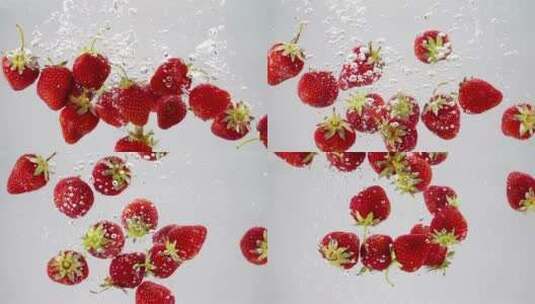 一串草莓掉进水里高清在线视频素材下载