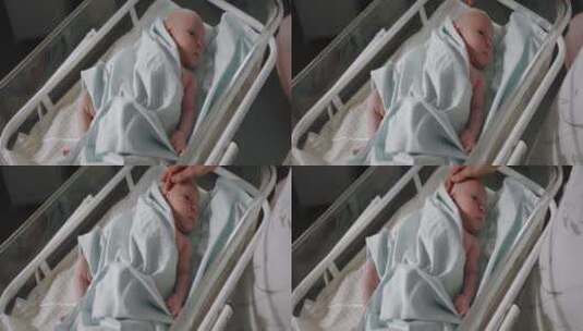 婴儿床上的新生儿高清在线视频素材下载