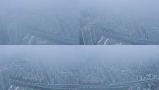 大雾天气广州城市建筑群与公路车流航拍高清在线视频素材下载