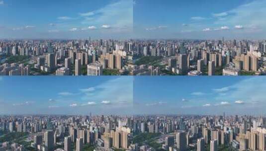 航拍蓝天白云城市天际线现代高楼建筑高清在线视频素材下载