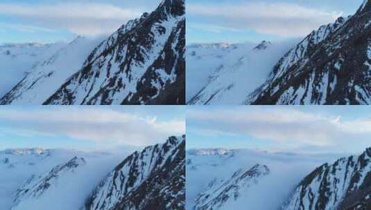 无人机贴着山脊飞行雪山航拍风景高清在线视频素材下载