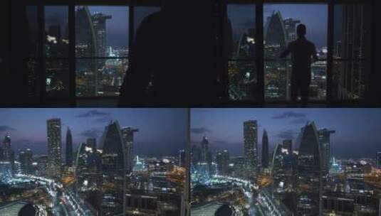 男人站在阳台看夜景高清在线视频素材下载