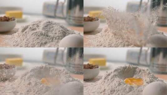 鸡蛋落在面粉堆上面粉溅起高清在线视频素材下载