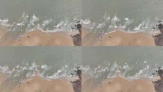 阴天沙滩海水浪花俯拍海边潮汐海水冲刷沙滩高清在线视频素材下载