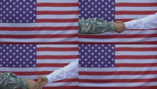 美国国旗背景下握手高清在线视频素材下载