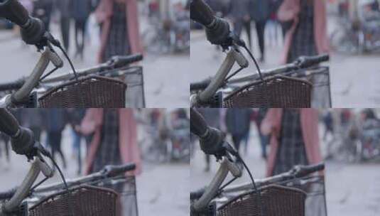 自行车把手与行人在背景中的特写镜头高清在线视频素材下载