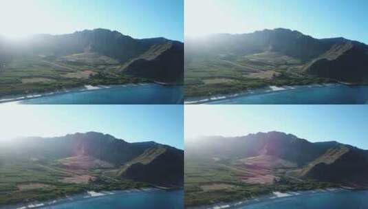 无人机拍摄显示夏威夷瓦胡岛日出时美丽的马库亚山谷和马库亚海滩。高清在线视频素材下载