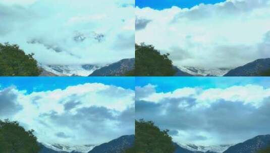 西藏林芝雪山云雾树木前景延时摄影高清在线视频素材下载