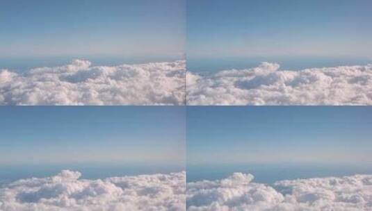 从飞机窗口飞机视角俯瞰云层高清在线视频素材下载