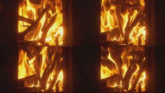 干柴烈火木炭燃烧火焰炉灶加柴高清在线视频素材下载