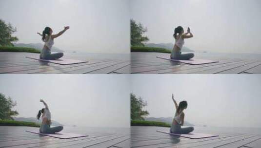 人物海边栈道做瑜伽高清在线视频素材下载