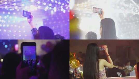 女孩在晚会现场用手机拍照高清在线视频素材下载