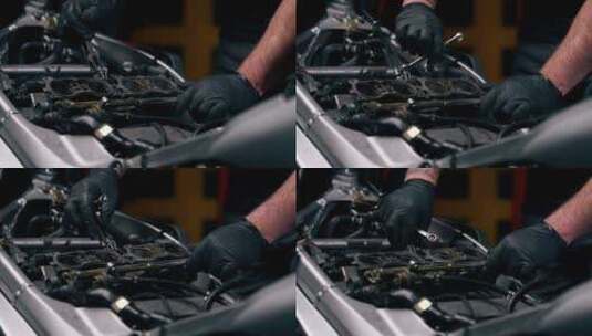 摩托车修理厂的特写镜头用螺丝拧开摩托车备高清在线视频素材下载
