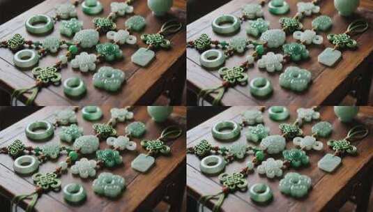 木桌上的翡翠玉石饰品高清在线视频素材下载