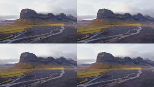 4k航拍冰岛绿色高山溪流黑沙高清在线视频素材下载