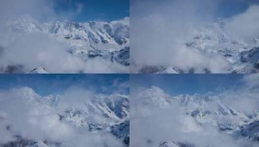 云层中的雪山高清在线视频素材下载