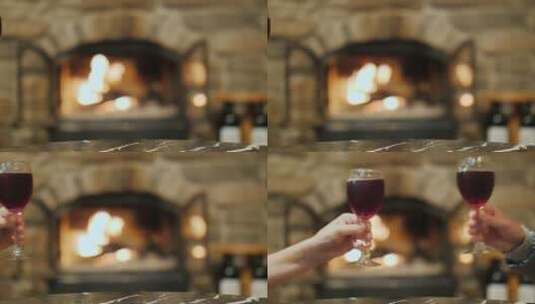 壁炉前用红酒杯干杯高清在线视频素材下载