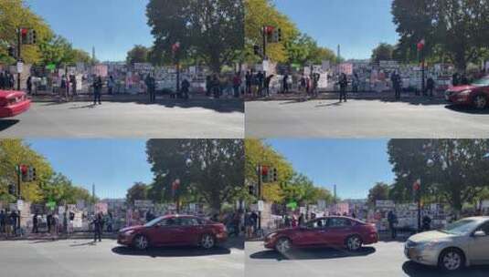 汽车驶过抗议者高清在线视频素材下载