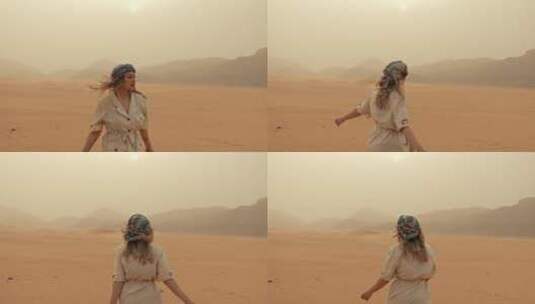 女人在沙漠中旋转高清在线视频素材下载