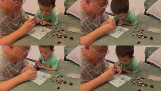 小孩子和爸爸拼积木高清在线视频素材下载