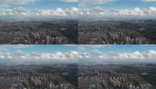 蓝天白云下的城市航拍高清在线视频素材下载