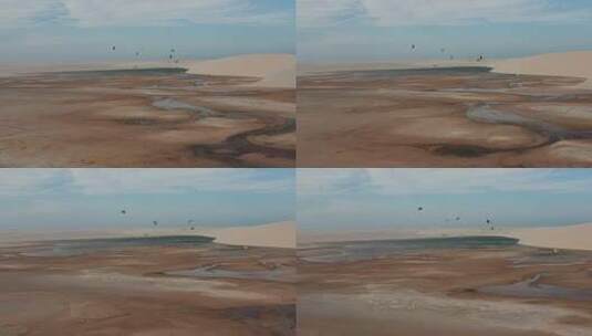 一群人在沙丘放风筝高清在线视频素材下载
