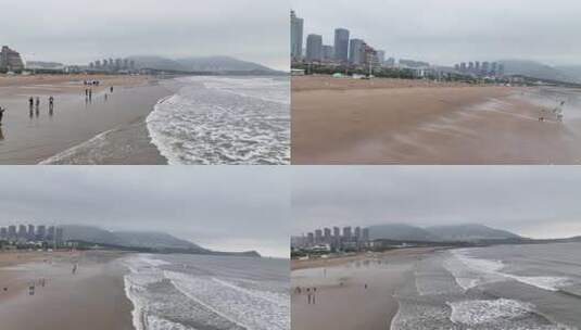 青岛石老人海水浴场沙滩航拍高清在线视频素材下载