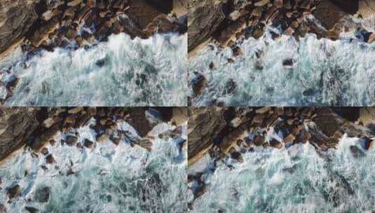 海浪拍击在海边石壁上高清在线视频素材下载
