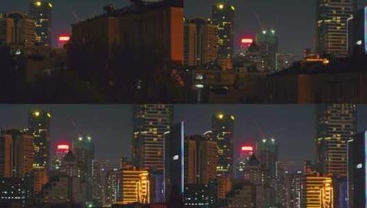 航拍南京新街口市中心高楼夜景灯光高清在线视频素材下载