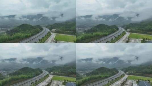 森林公路航拍雨后森林高速公路树林云雾风景高清在线视频素材下载