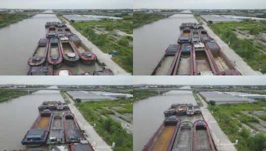 河道停靠的货船休息充电4K航拍高清在线视频素材下载