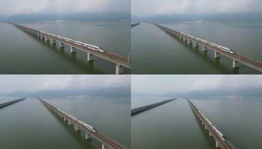 高铁驶过城市跨江大桥高清在线视频素材下载